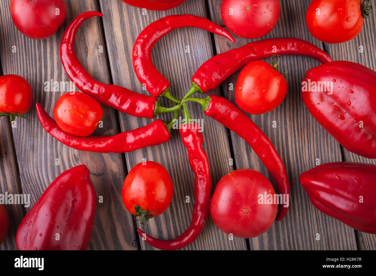 The set of red vegetables on wooden table Stock Photo - Alamy