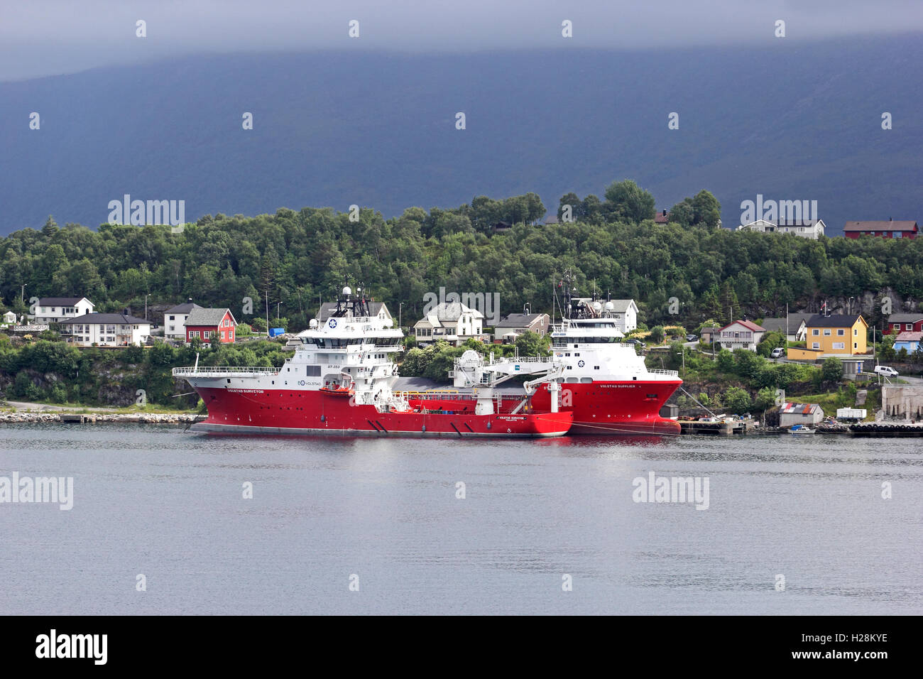 Volstad Surveyor, a research / survey vessel and Volstad Supplier, a platform supply vessel, moored in Alesund, Norway Stock Photo