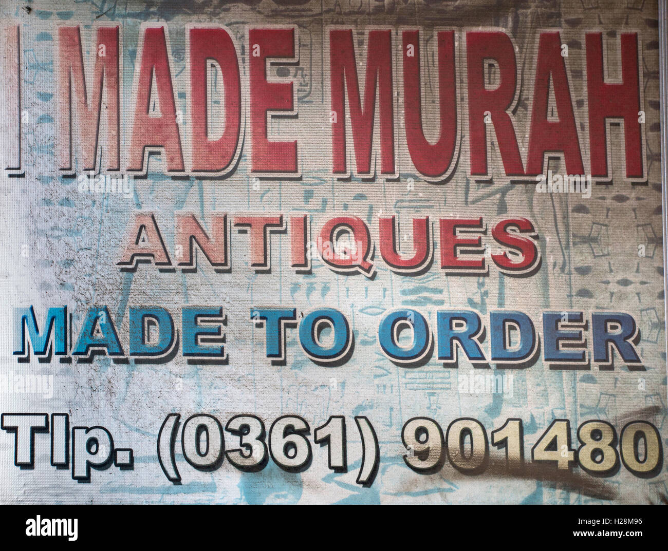 Indonesia, Bali, Ubud, Peliatan, Jl. Raya Andong, craft shop sign, ‘Antiques made to order’ Stock Photo