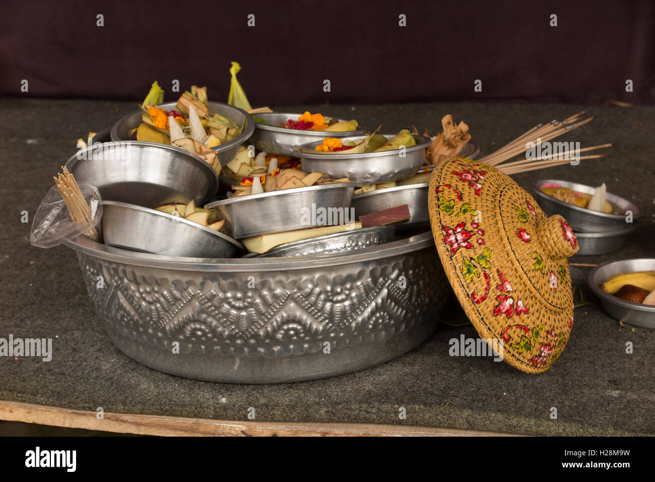 Indonesia, Bali, Batur, Pura Ulun Danu Batur, Kuningan festival offerings in metal bowl Stock Photo