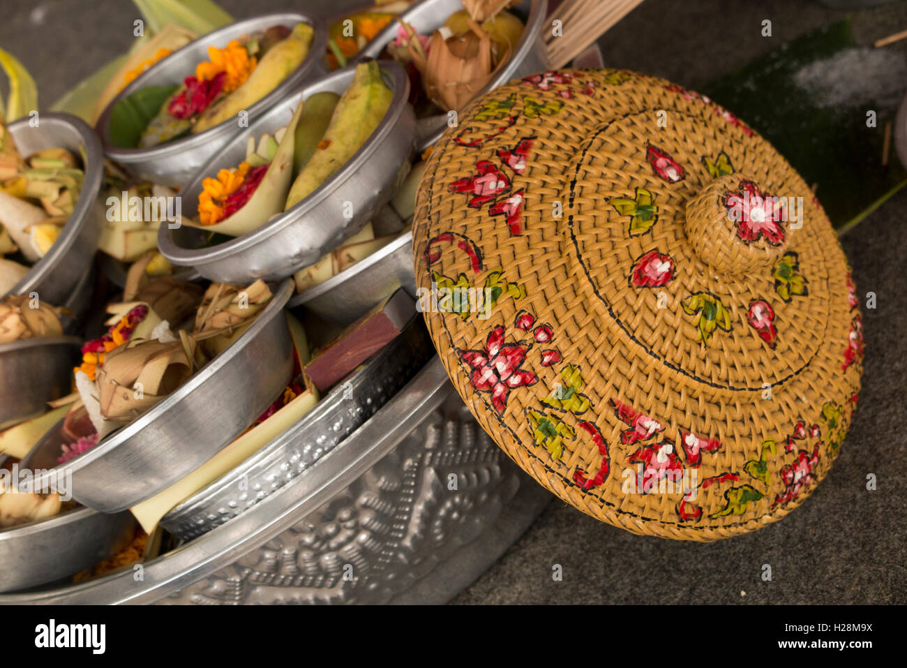 Indonesia, Bali, Batur, Pura Ulun Danu Batur, Kuningan festival offerings in metal bowl Stock Photo