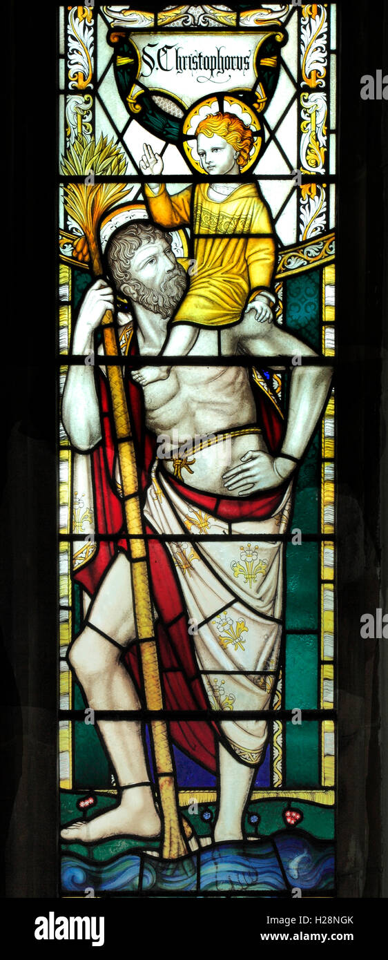 St Christopher, Wells next the Sea, stained glass, Norfolk, 19th century Victorian windows saint saints England UK Stock Photo
