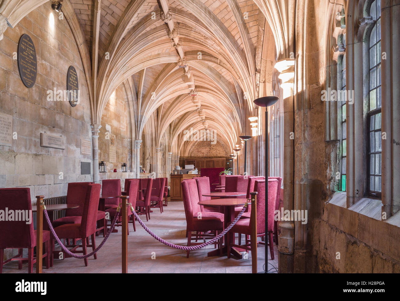 Cafe in the cloister of the christian church of St Bartholomew (St Bart's), the oldest surviving church in London. Stock Photo