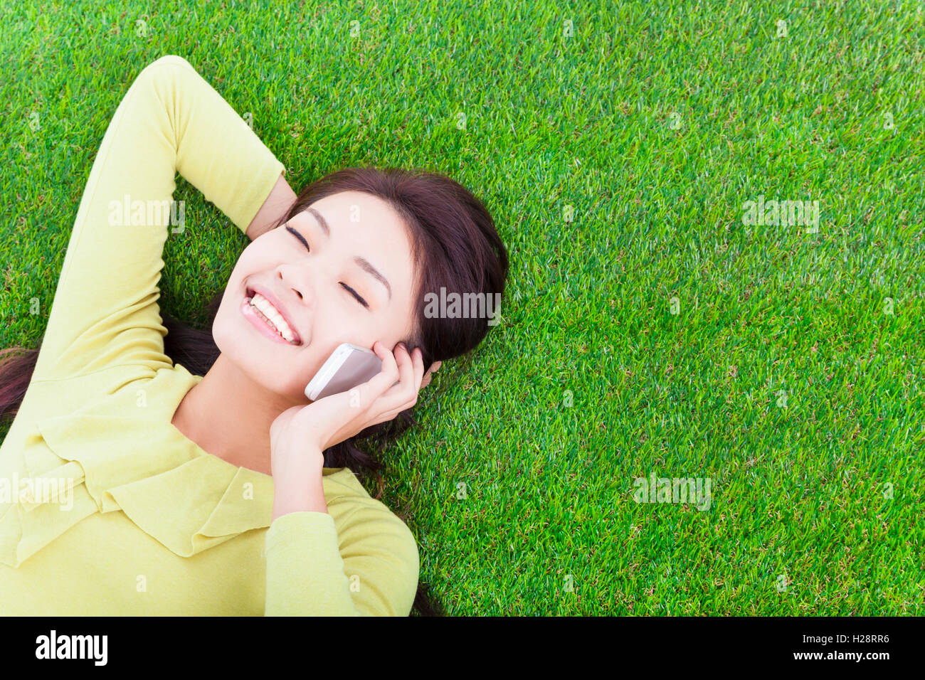 young girl outside communication with mobile phone Stock Photo - Alamy