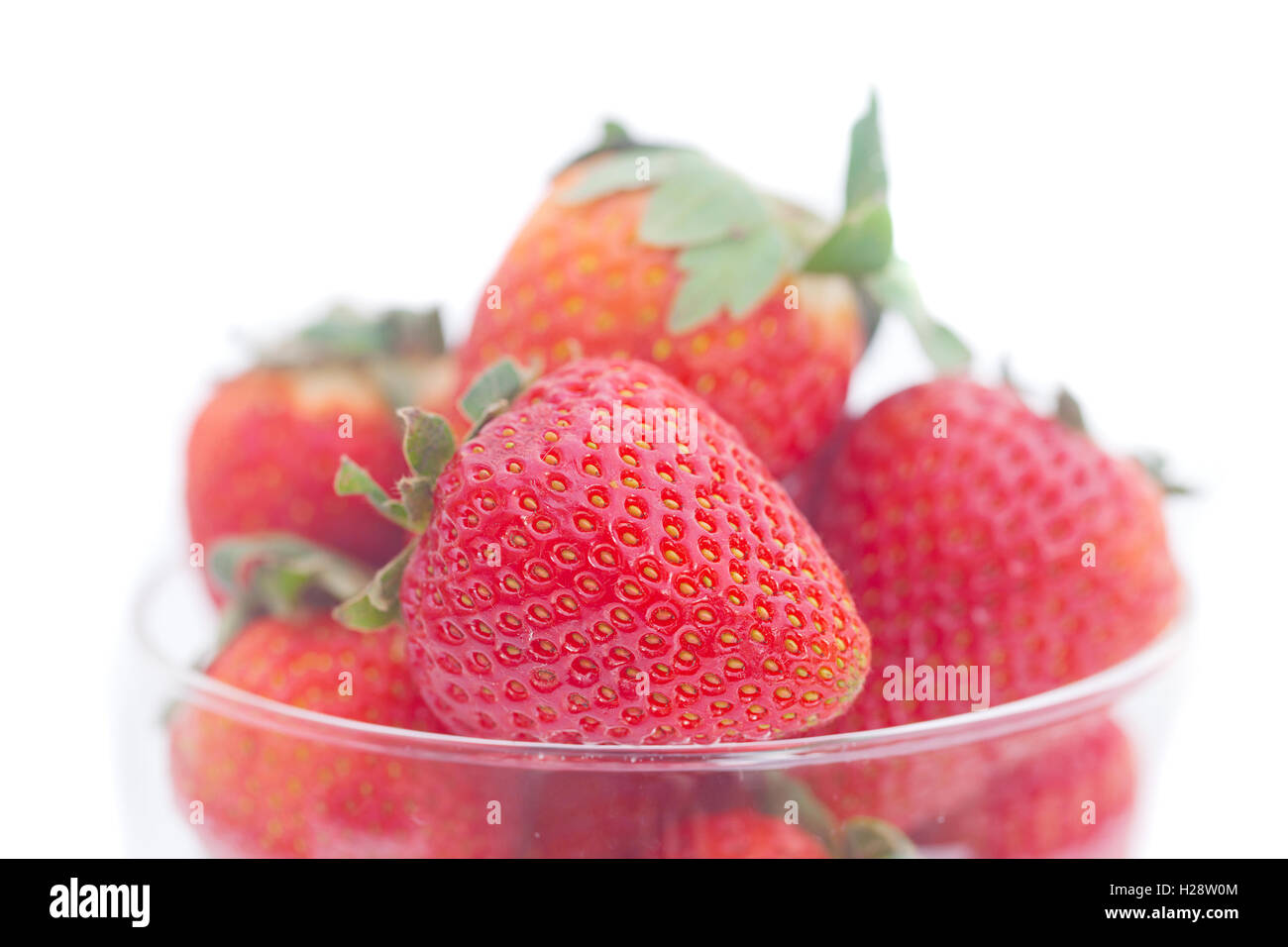 strawberry in a glass bowl isolated on white Stock Photo - Alamy