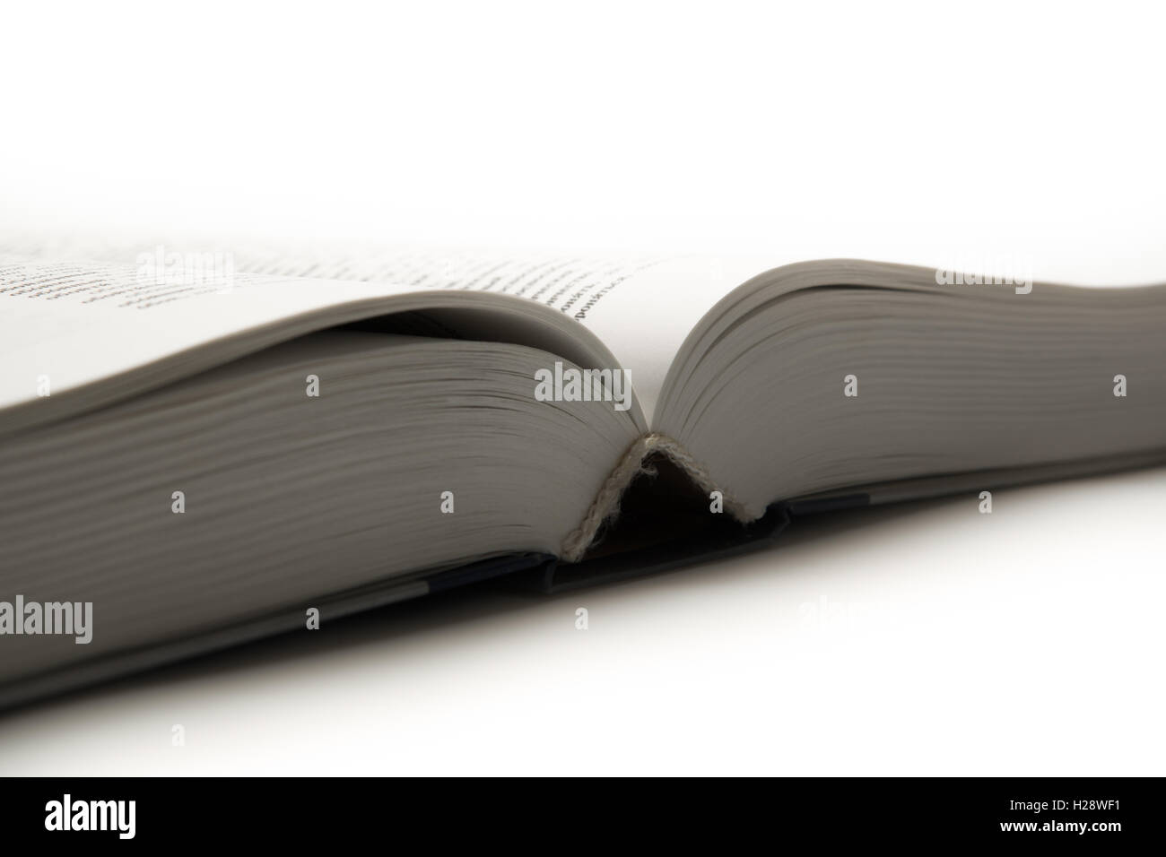 open book on white Stock Photo - Alamy