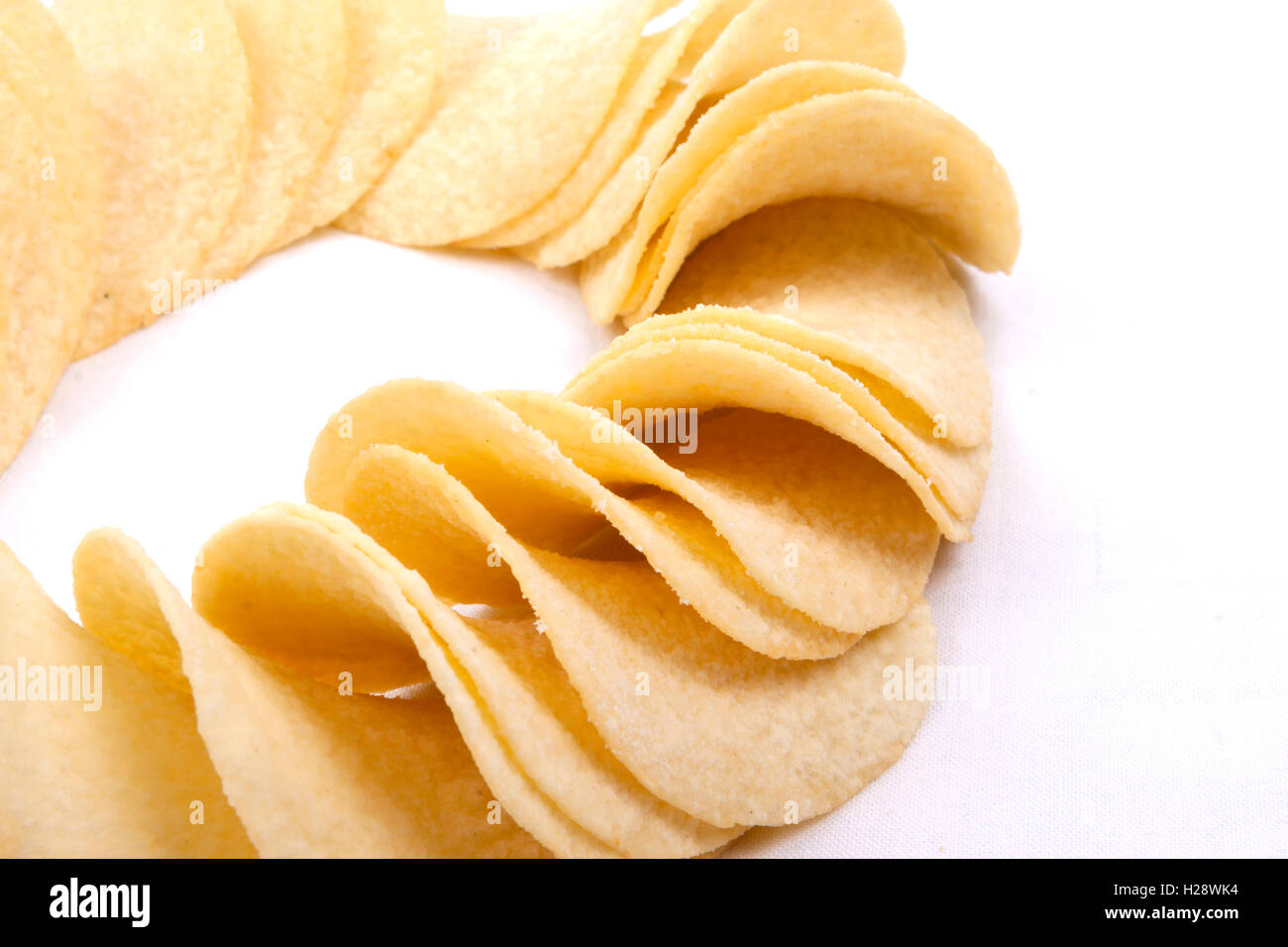 potato crisps (chips) on a white background Stock Photo