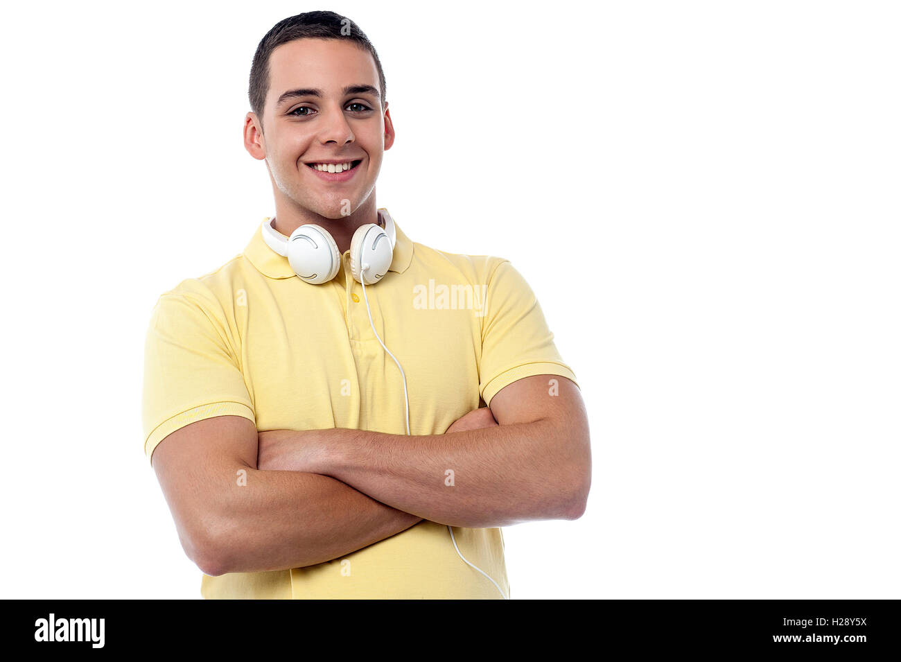 Fashion guy with headphones around his neck Stock Photo