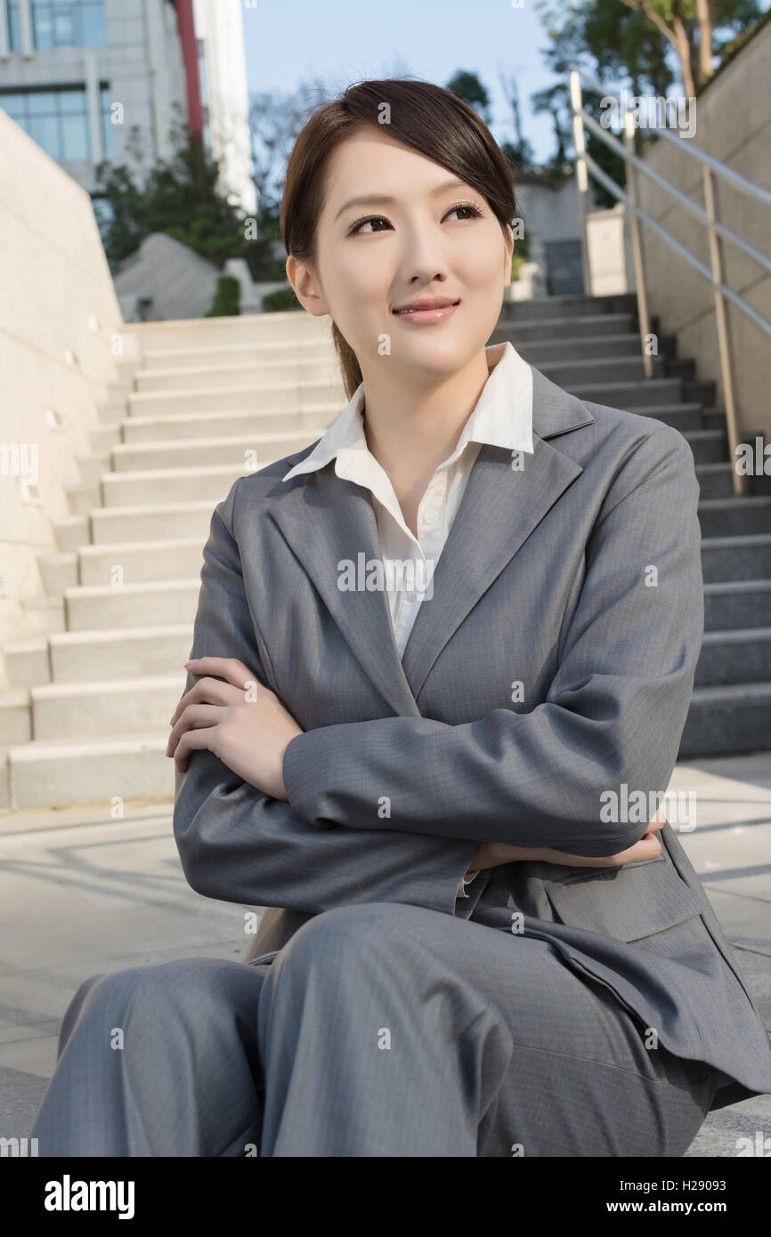 Successful smiling asian female hi-res stock photography and images - Alamy