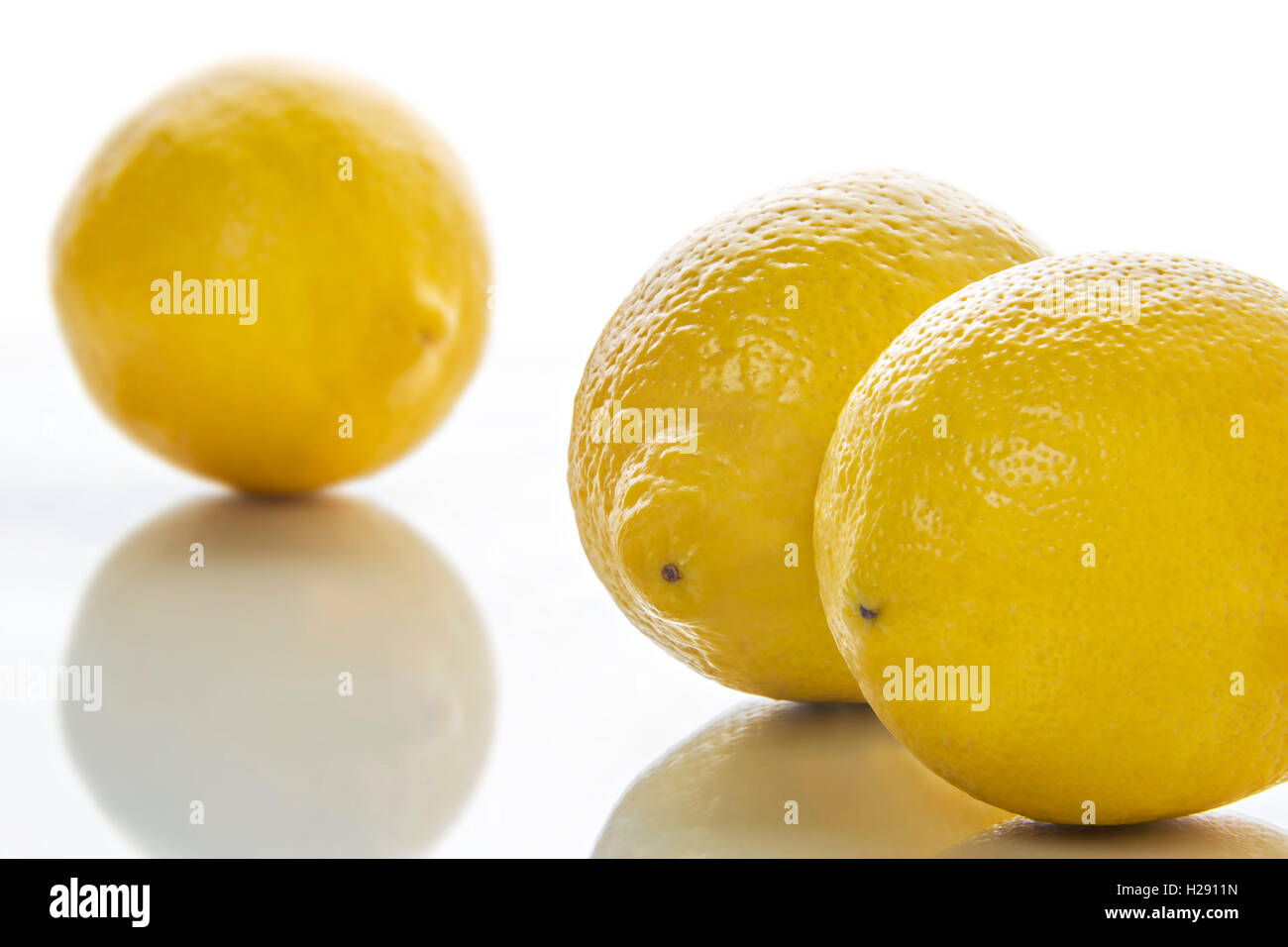 Three yellow limes Stock Photo Alamy