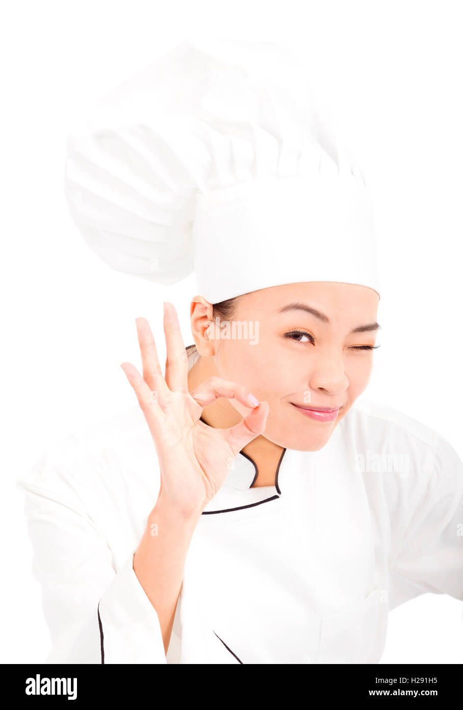 Asian chef baker or cook showing ok hand sign Stock Photo Alamy