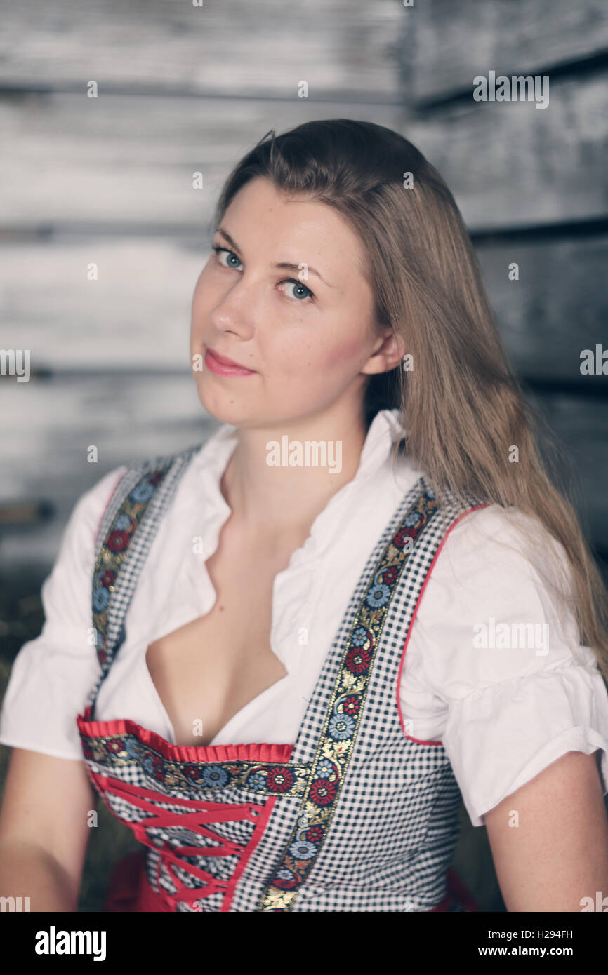 Beautiful Woman In Traditional German Dress On Hay Stock Photo Alamy