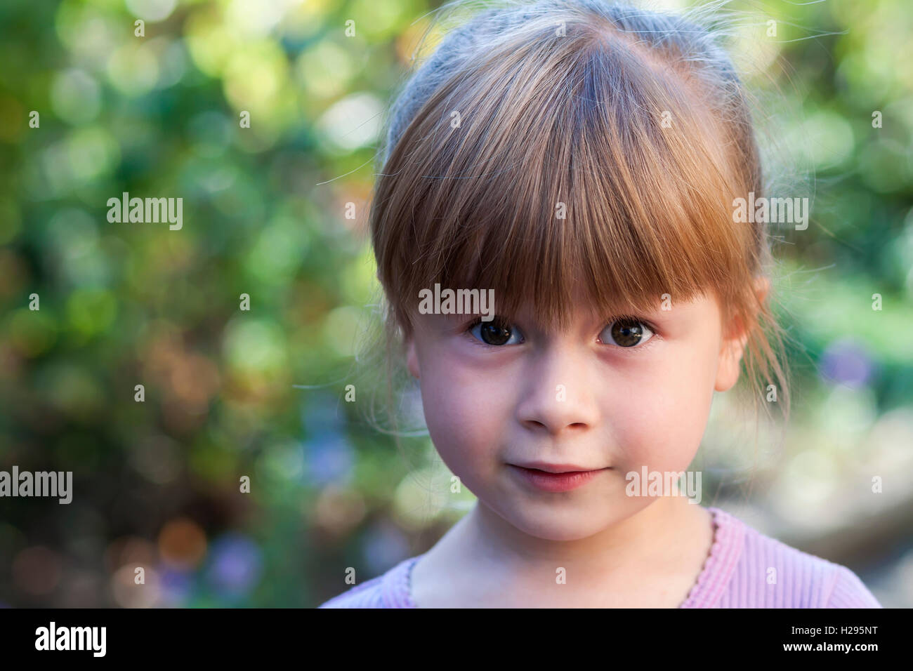 Portrait of little girl with surprised expression on face Stock Photo ...