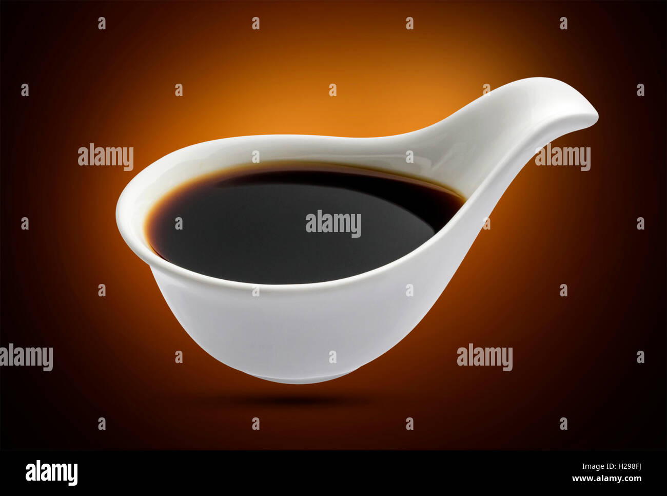 Soy sauce in bowl isolated, shoyu closeup in dish Stock Photo Alamy