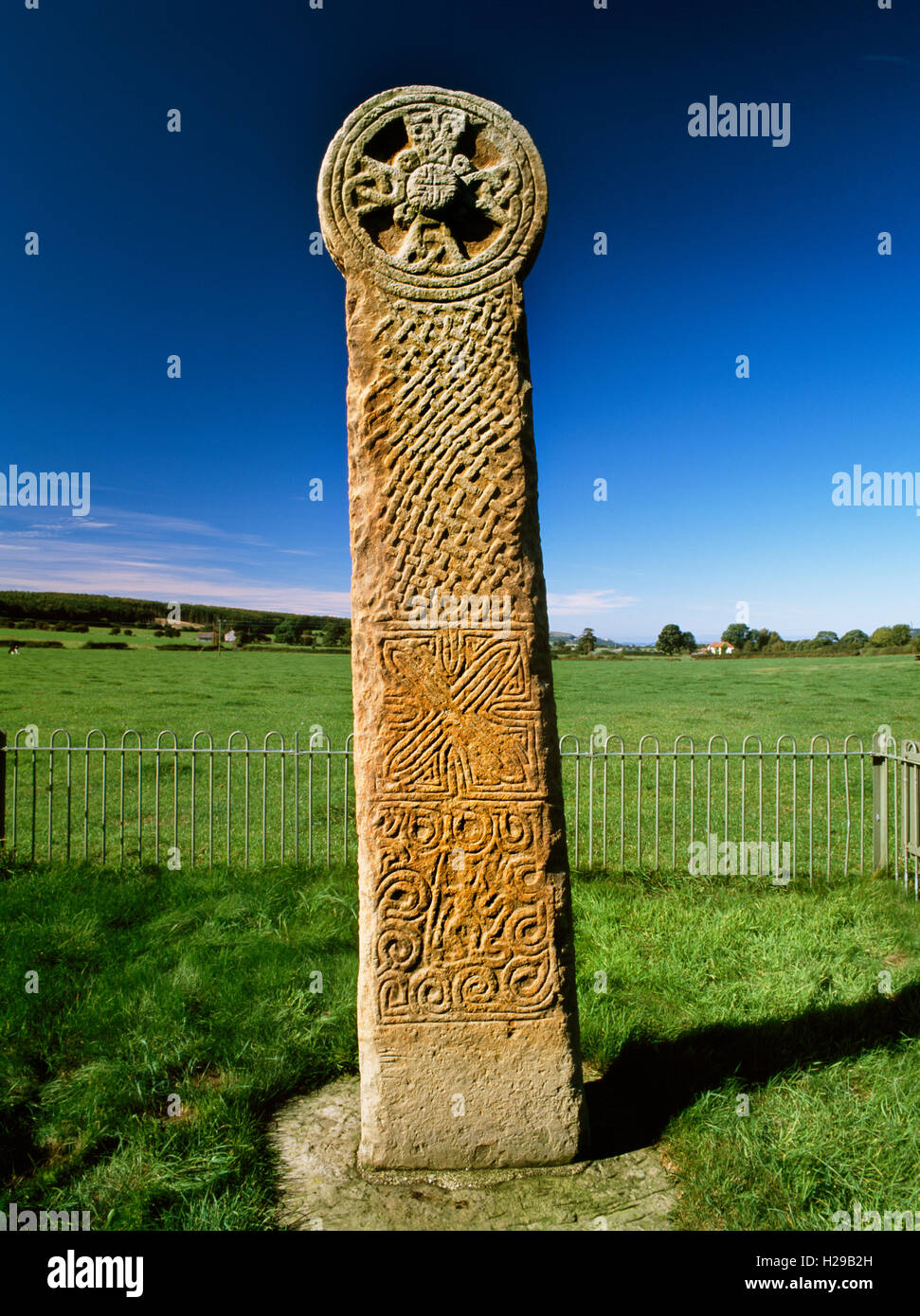 E face of Maen Achwyfan Cross, a late C10th disc-headed wayside cross still in its original position near Whitford, Flintshire. Stock Photo