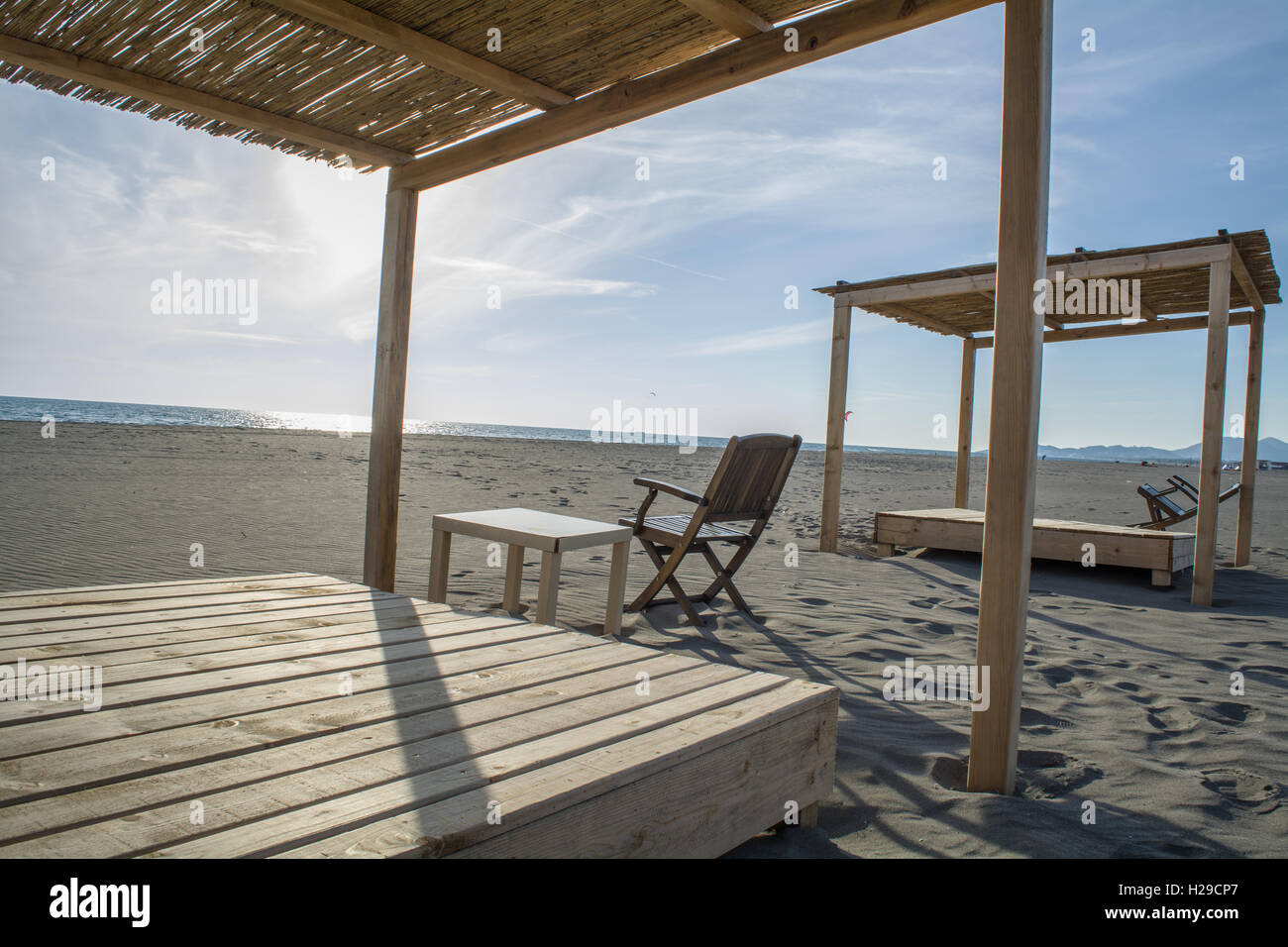 Wooden beds on the beach Stock Photo Alamy