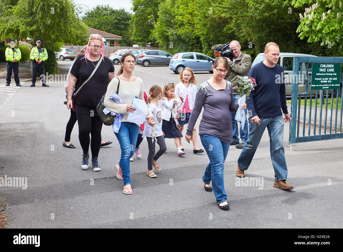 Parents and children leave All Saints Primary School the day after pupil Derrin Jordon's body was found Stock Photo