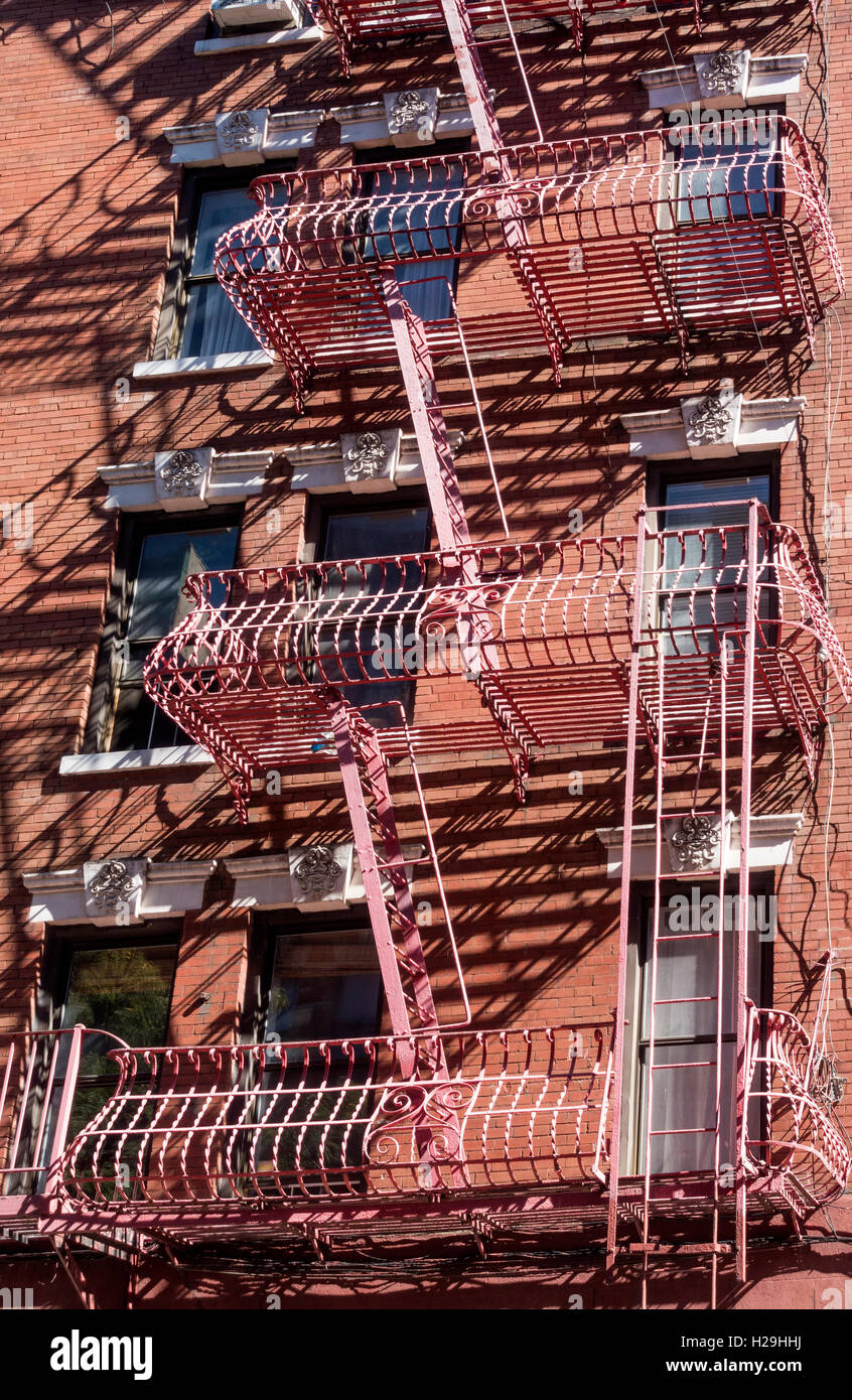 Fire escapes on a tenement building in Lower Manhattan Stock Photo