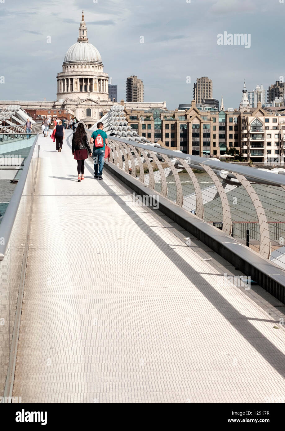 The Millennium footbridge London and Saint Pauls cathedral dome. Stock Photo