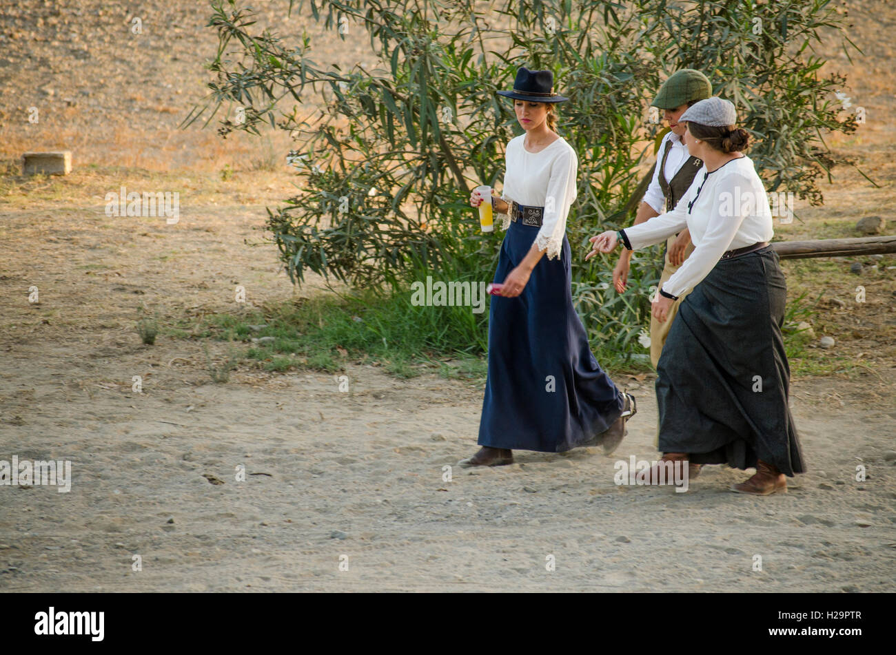 Three girls traditional dressed at Romeria of Fuengirola, religious pilgrimage one week before the annual fair, Fuengirola, Andalusia, Spain. 25 september, 2016.  Feria Credit:  Perry van Munster/ Alamy Live News Stock Photo
