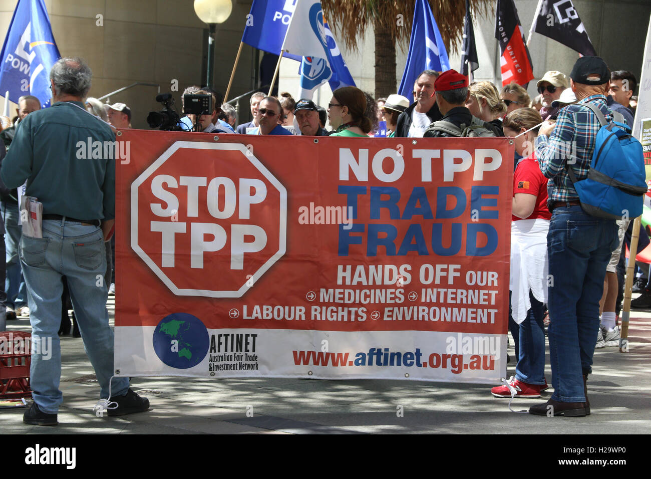 Sydney, Australia. 26 September 2016. Protesters gathered across the road from the hearing of the Parliamentary inquiry into the TPP at 1 Bligh Street, Sydney to rally against the Trans Pacific Partnership. They say the TPP expands corporate power at the expense of access to medicines, workers' rights and the environment. Credit:  Richard Milnes/Alamy Live News Stock Photo