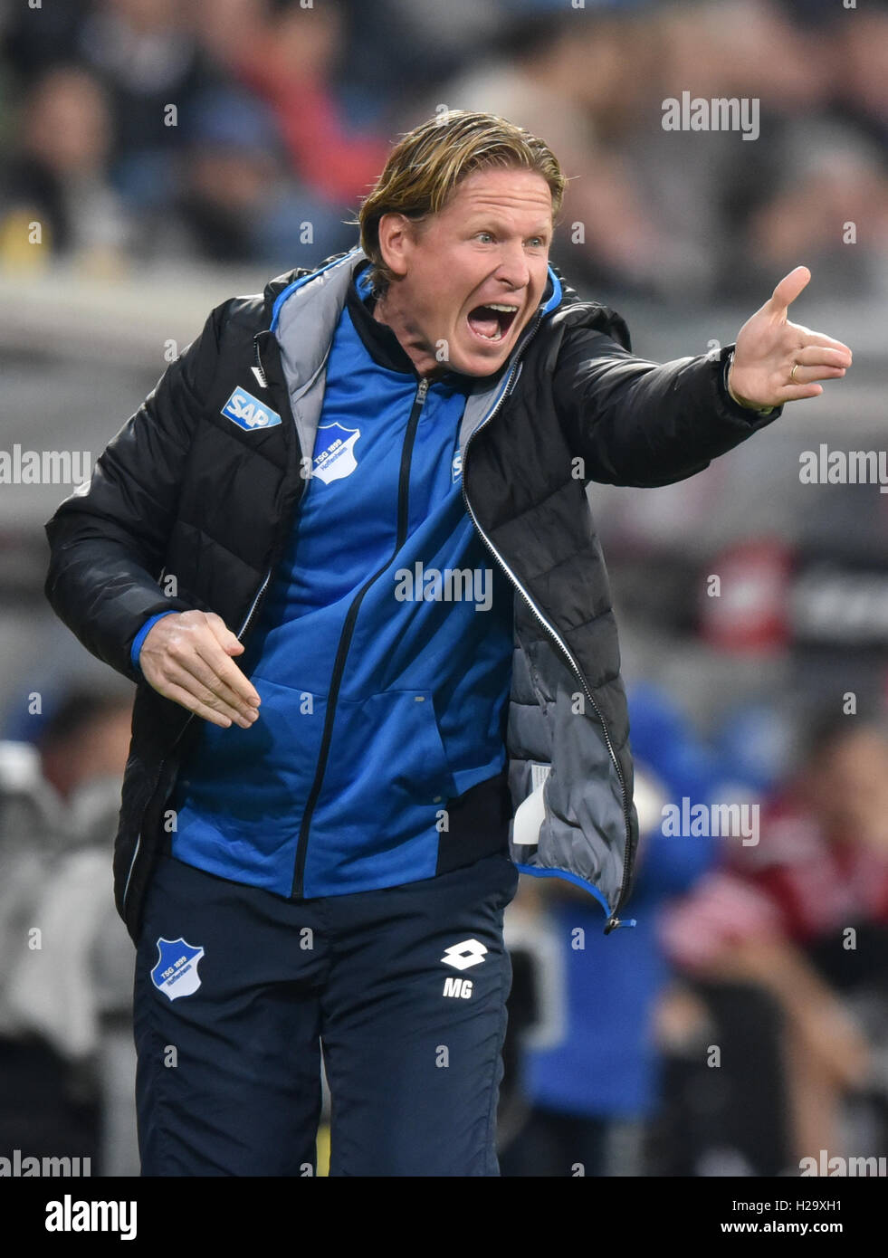 Sinsheim, Germany. 18th Oct, 2013. Hoffenheim's Kai Herdling (R) and  Leverkusen's Sebastian Boenisch debate after the Bundesliga soccer match  between 1899 Hoffenheim and Bayer Leverkusen at Rhein-Neckar-Arena in  Sinsheim, Germany, 18 October