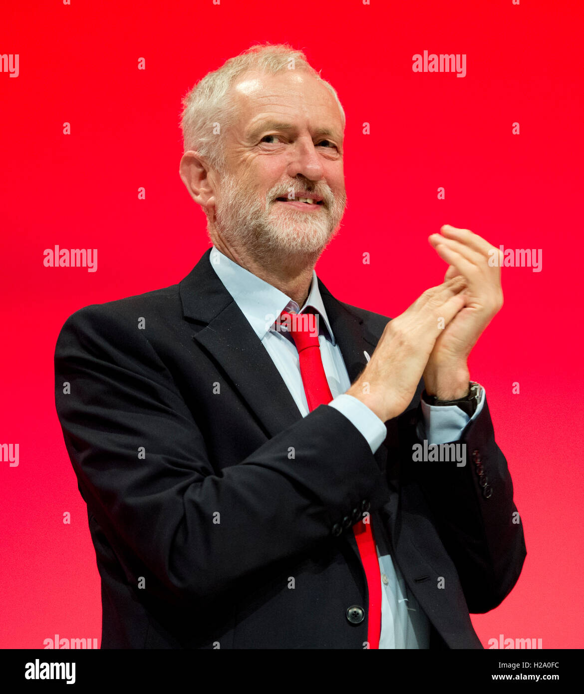 Liverpool, UK. 26th September 2016. Labour leader Jeremy Corbyn applauds during day two of the Labour Party Conference in Liverpool. Credit:  Russell Hart/Alamy Live News. Stock Photo