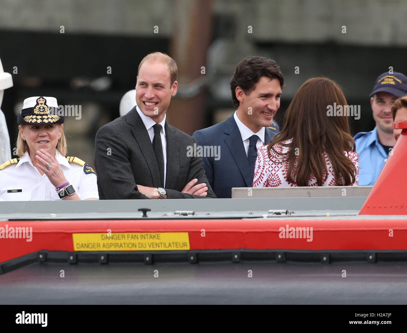 The Duke and Duchess of Cambridge with Canadian Prime Minister Juston Trudeau onboard a hovercraft during their visit to Kitsilano Coast Guard Station in Vancouver on Day Two of their tour of Canada. Stock Photo