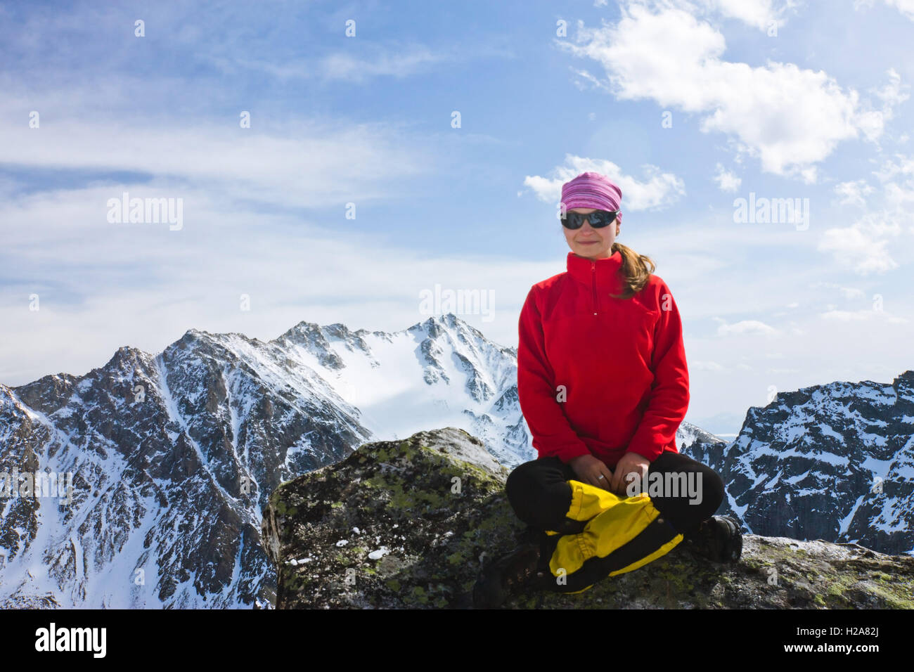 Portrait of a woman with glasses smiling tourists in the snowy ...