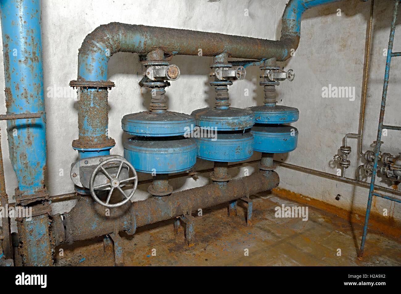 Pipes in an underground bunker Stock Photo
