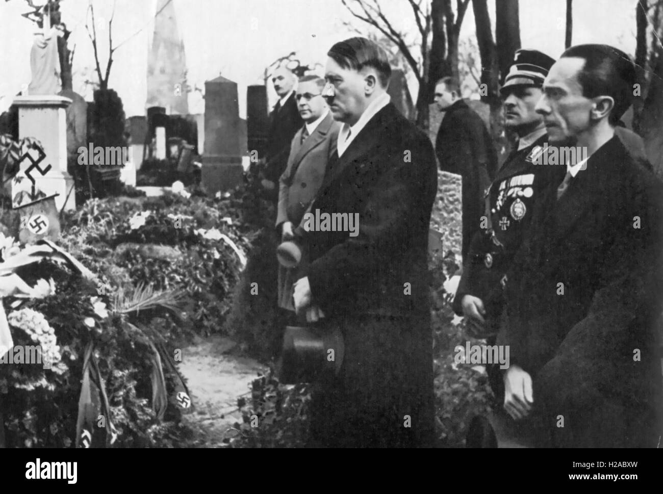 JOSEPH GOEBBELS at right with Hitler at the Berlin cemetery memorial to Nazi dead about 1941 Stock Photo