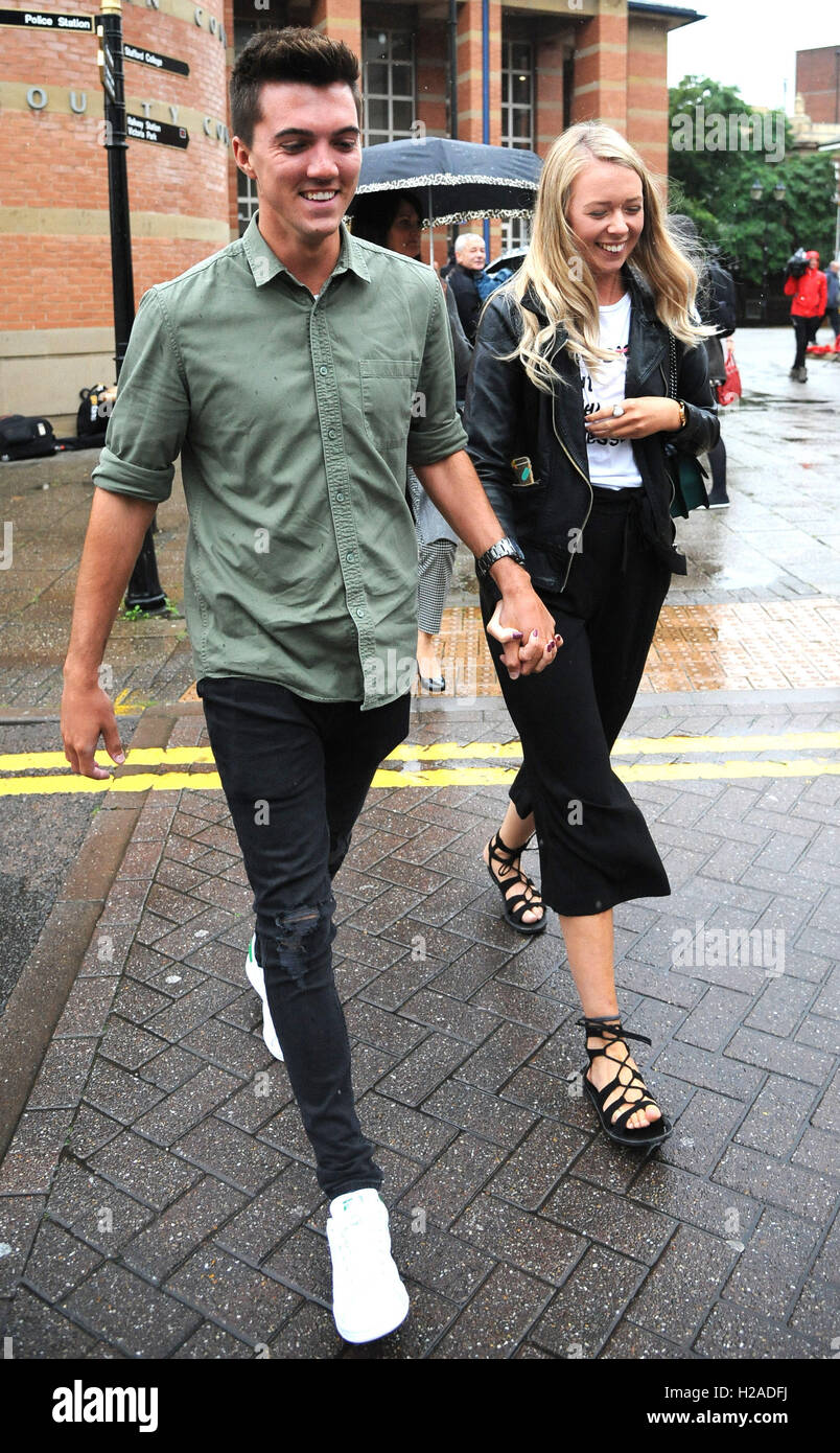 Alton Towers theme park Smiler ride accident victims Leah Washington and Joe Pugh outside Stafford Crown Court, where Alton Towers operator Merlin Attractions Operations Ltd was told it is facing a fine which could top &Acirc;&not;&Acirc;£10 million after admitting a health and safety breach following the Smiler rollercoaster crash which left five passengers with life-changing injuries. Stock Photo