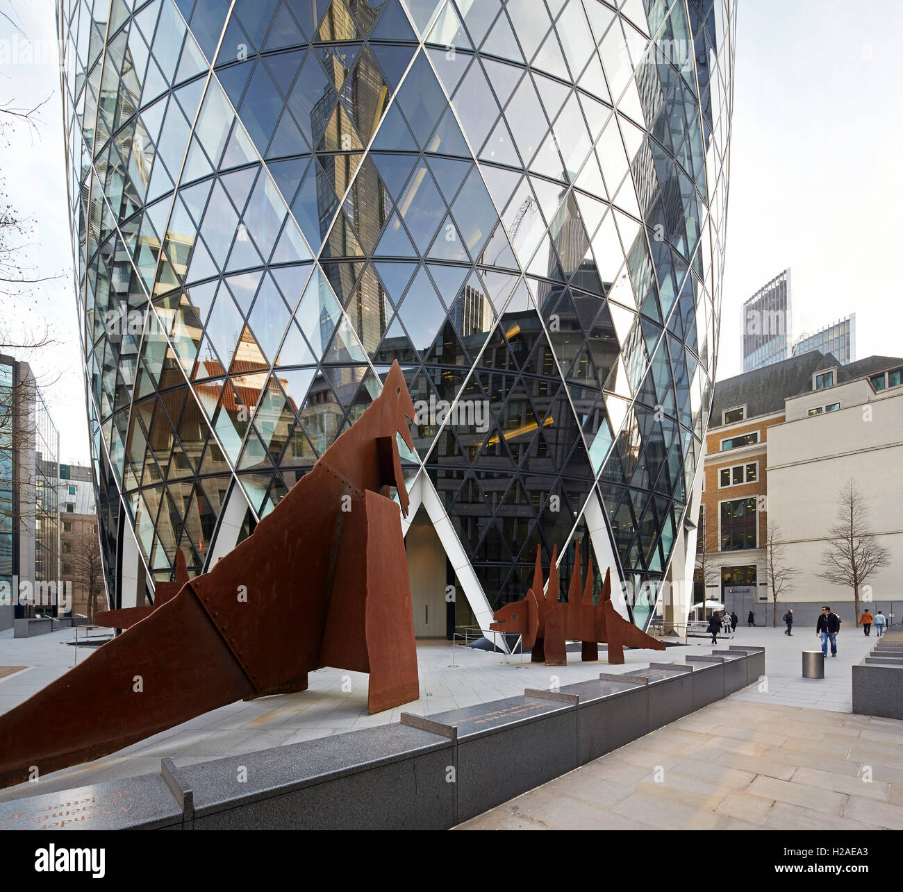 Base of building with reflection of neighbourhood. The Gherkin, London, United Kingdom. Architect: Foster + Partners, 2004. Stock Photo