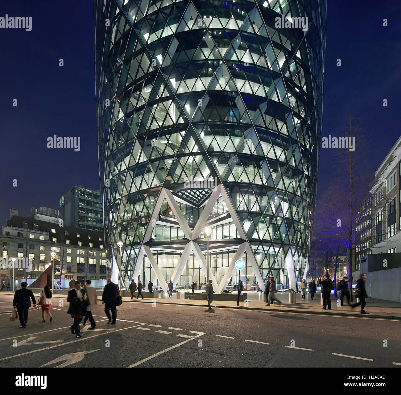 Building forecourt with entrance seen from street. The Gherkin, London, United Kingdom. Architect: Foster + Partners, 2004. Stock Photo