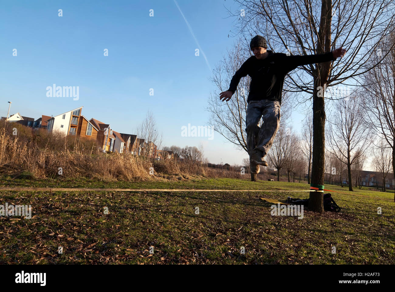 Andy Marland slack slacker slacklining Milton Keynes MK Big: Rock: Climbing jump jumping climb rock crag indoor gym wall Doug Bl Stock Photo