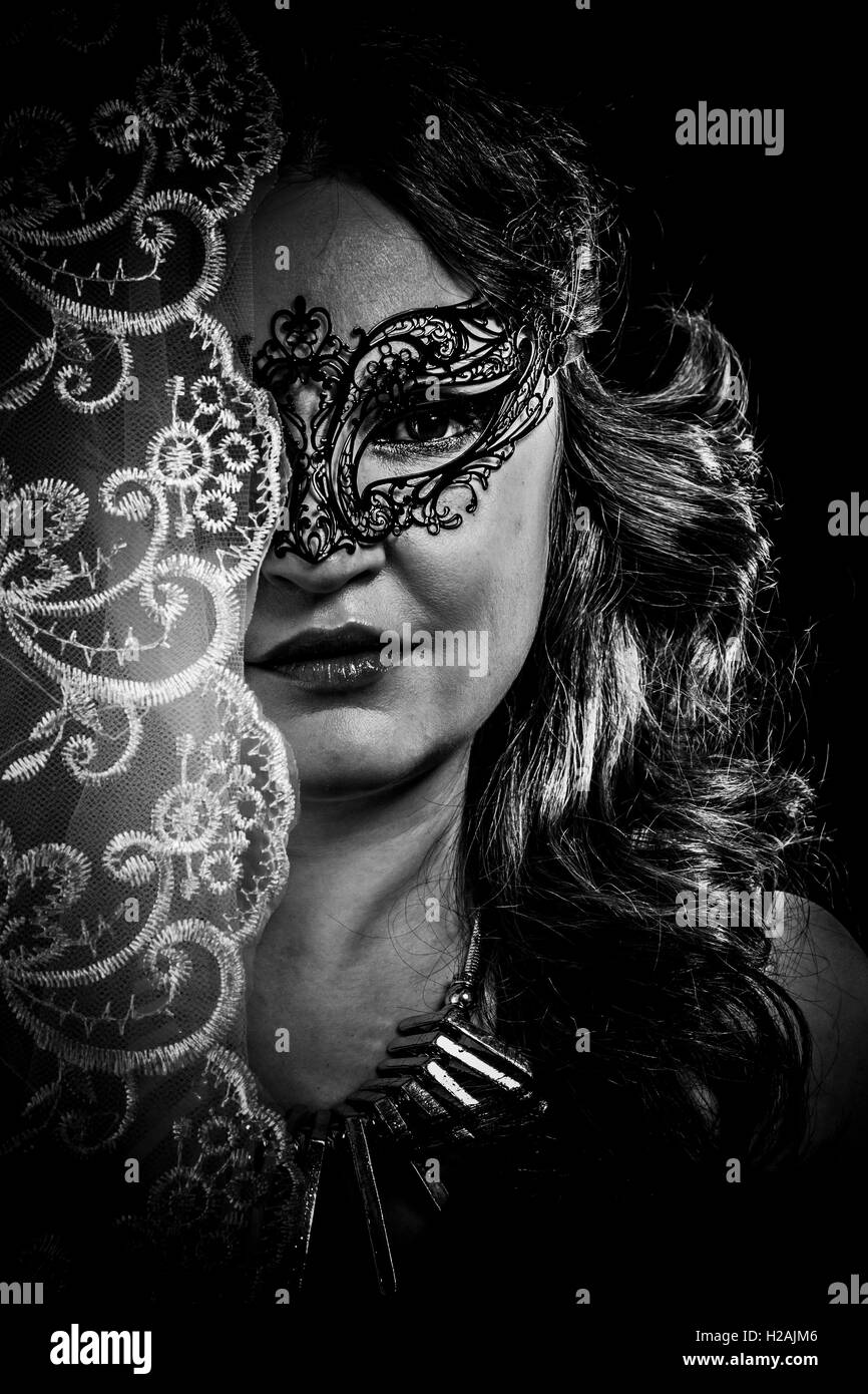 Mystery.Veiled virgin, spirituality concept. woman with mask pos Stock Photo