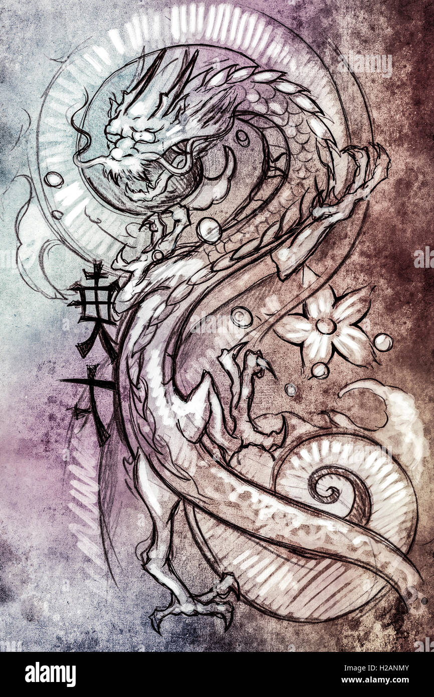 Tattoo art, sketch of a japanese dragon over colorful paper Stock Photo