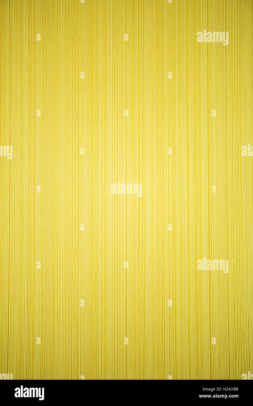 yellow striped textured wallpaper Stock Photo