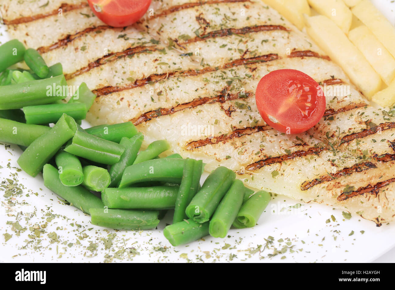 Pangasius fillet grilled with vegetables Stock Photo Alamy