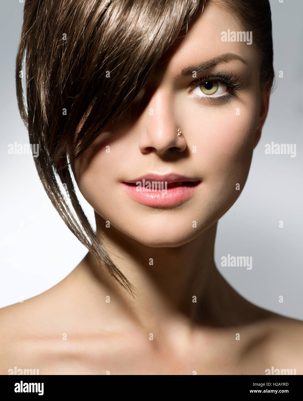 Stylish Fringe Teenage Girl With Short Hair Style Stock Photo