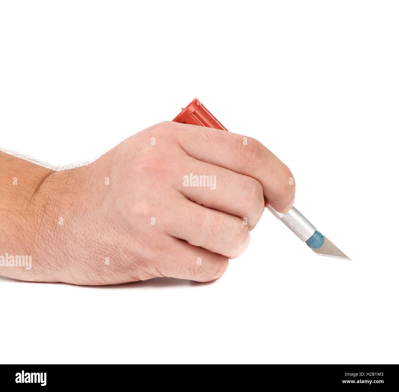 Hand holding a cutter knife Stock Photo Alamy