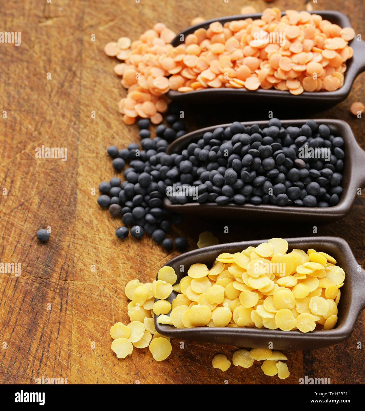 different varieties of lentils, red, yellow and black Stock Photo - Alamy