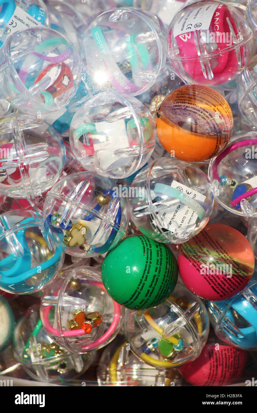 plastic balls with toys in Stock Photo Alamy