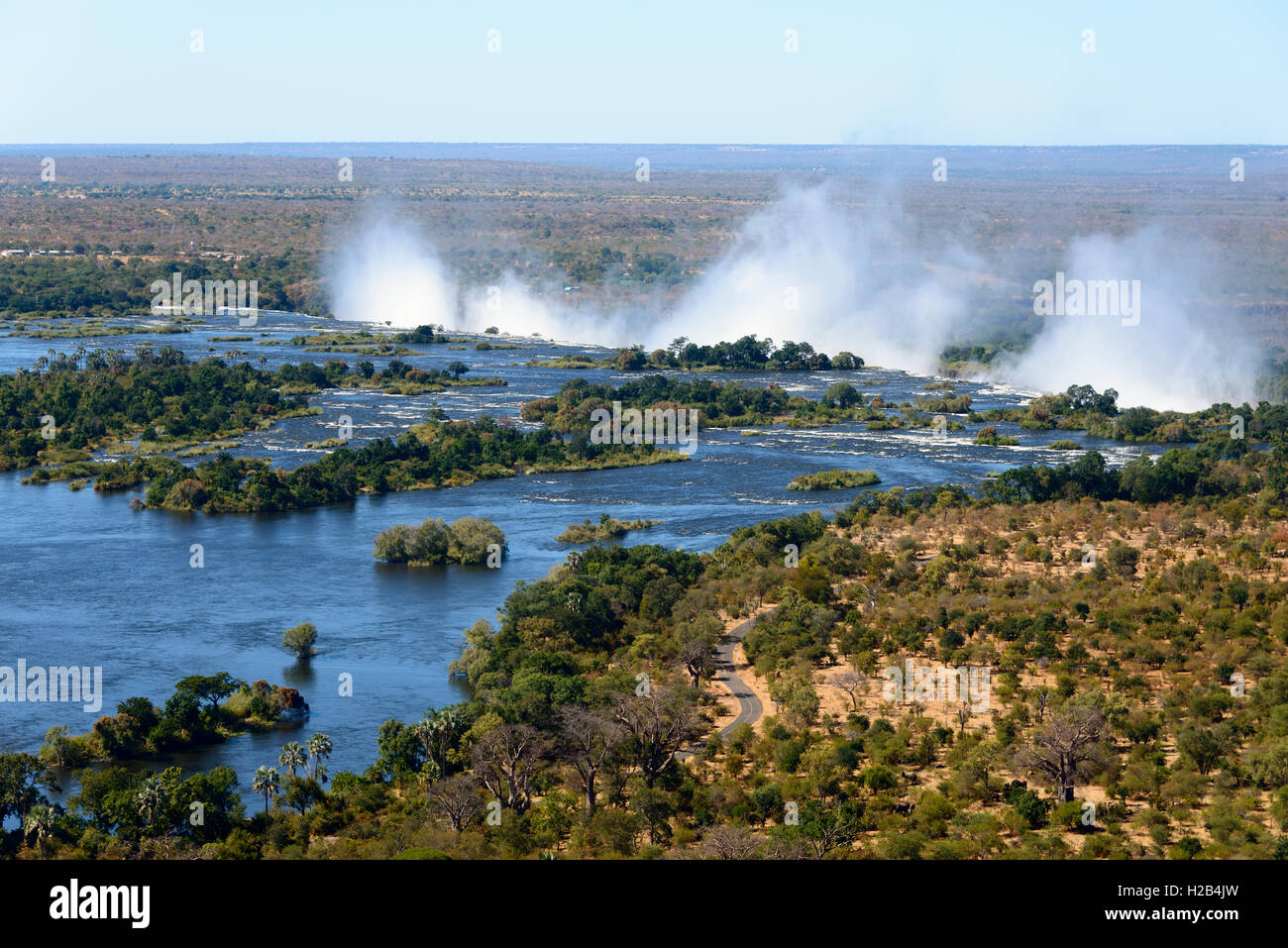 Aerial View, Zambezi river flows into the Victoria Falls, border of