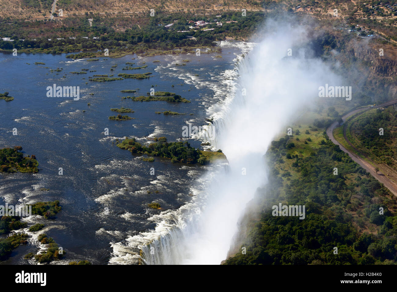 Aerial View, Zambezi river flows into the Victoria Falls, border of