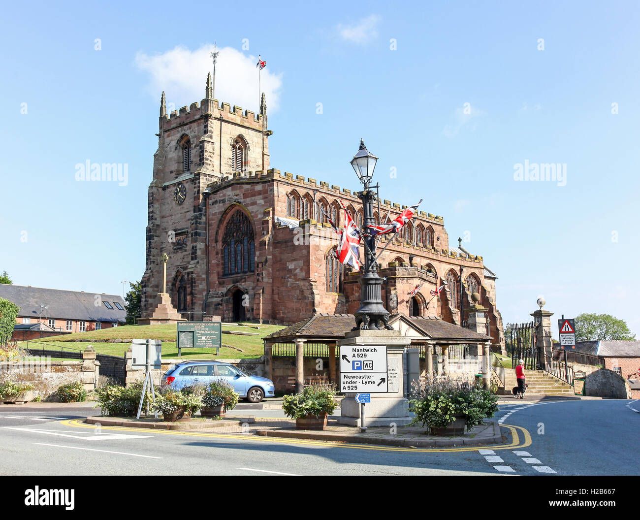 Parish Church of Saint James the Great in the centre of the village of Audlem Cheshire England UK Stock Photo
