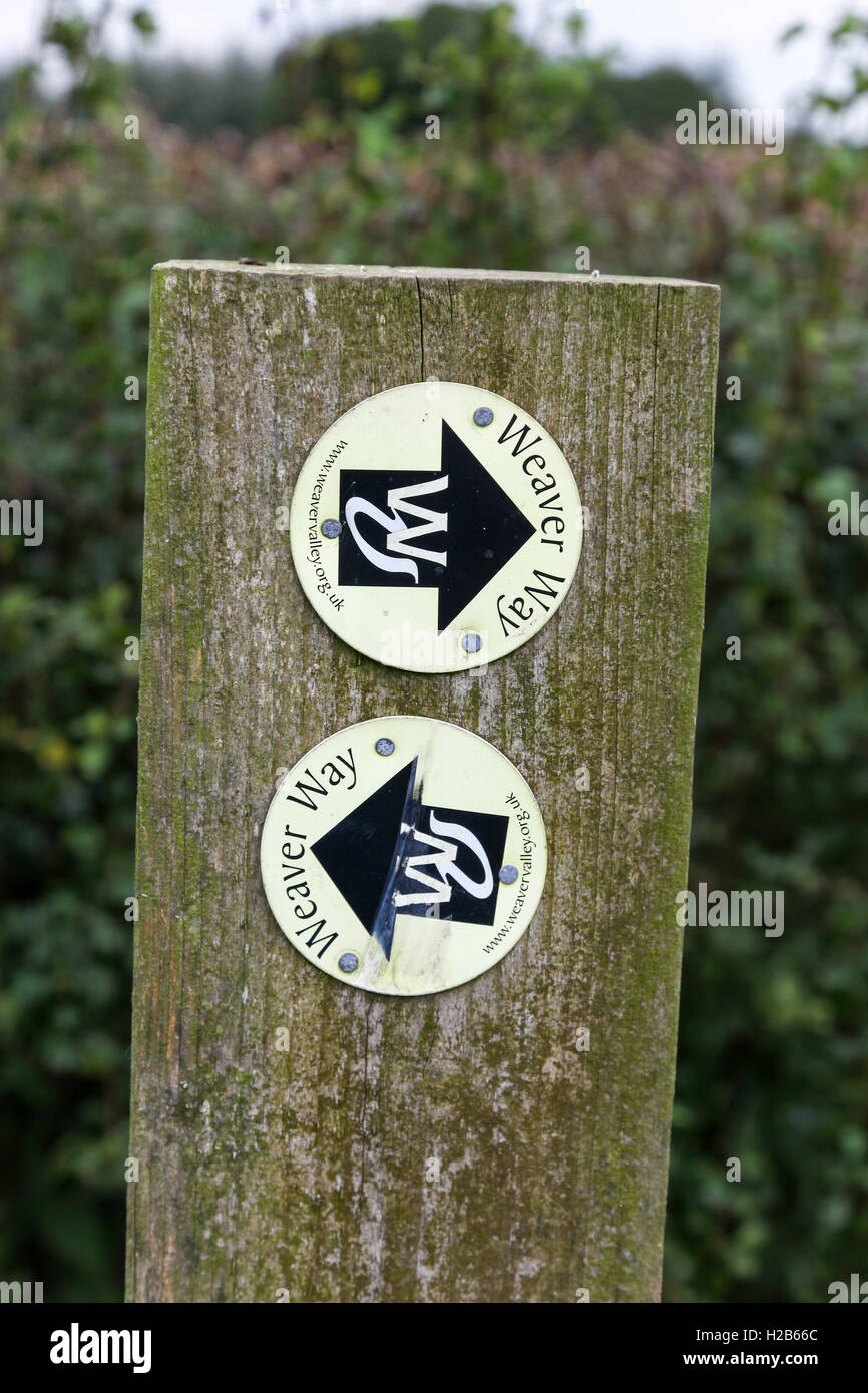 A wooden sign post with Weaver Way arrow signs Audlem Cheshire England UK Stock Photo