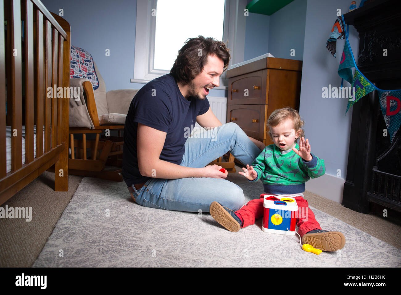 Stay-at-home dad, taking shared parental leave, one of just 3,000 British fathers said to be taking up shared parental leave. Stock Photo