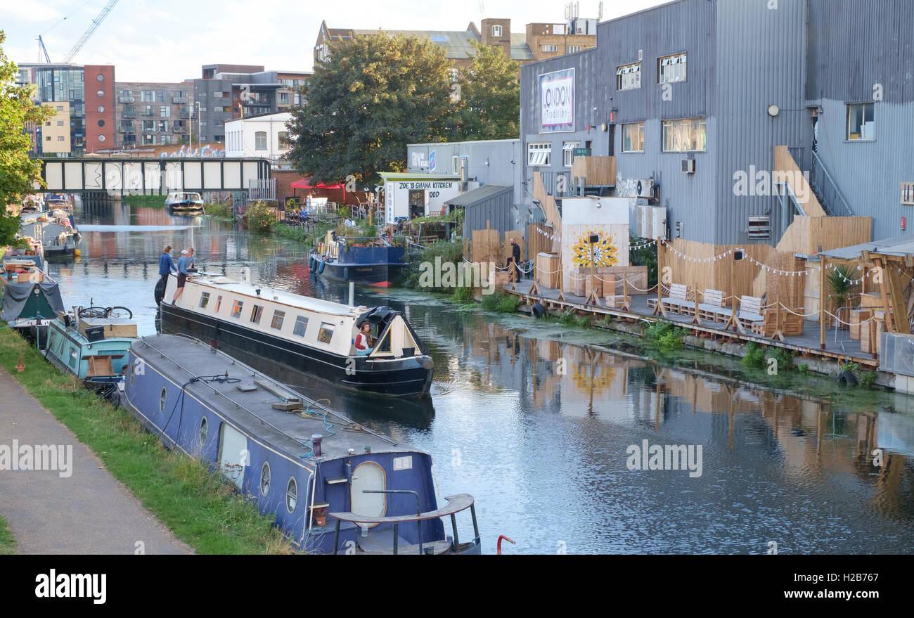 Lively canalside at Hackney Wick, home to many bars and narrowboats Stock Photo