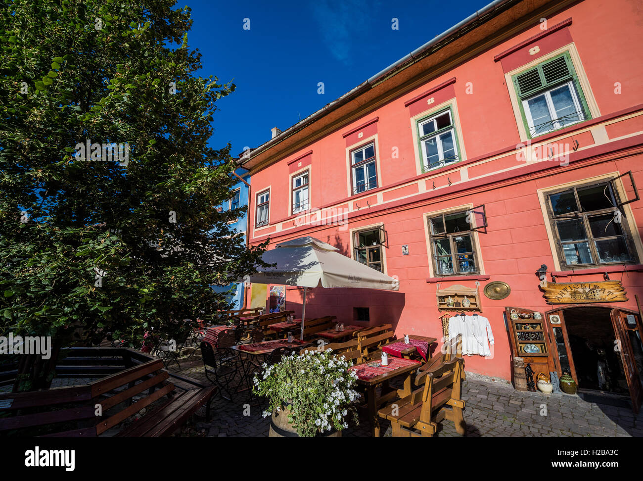 Houses at Citadel's Square in Historic Centre of Sighisoara city, Transylvania region in Romania Stock Photo